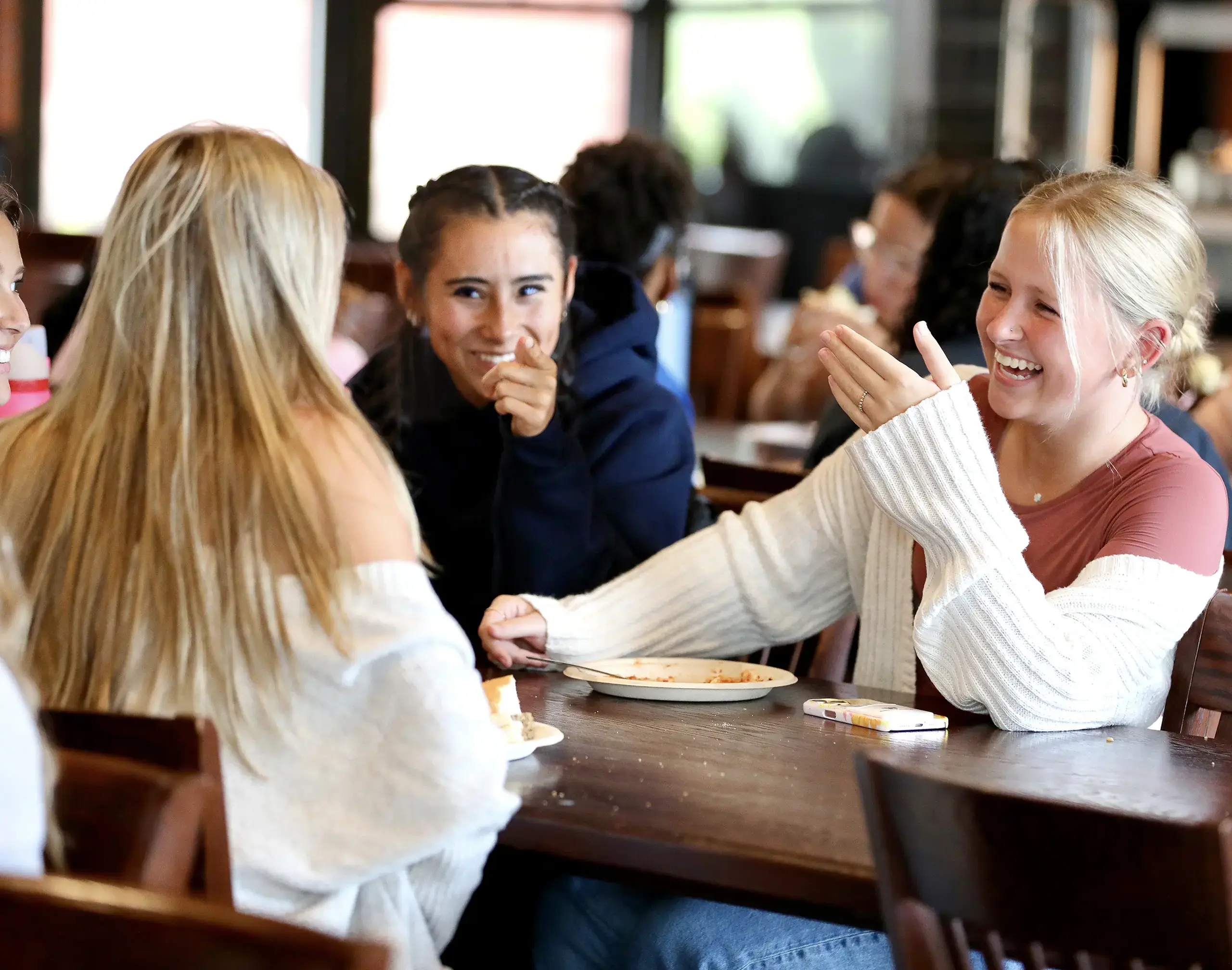 Upper School students at lunch laughing with friends.Experience Page - Content Landscape Image,Upper School Students,Lunch