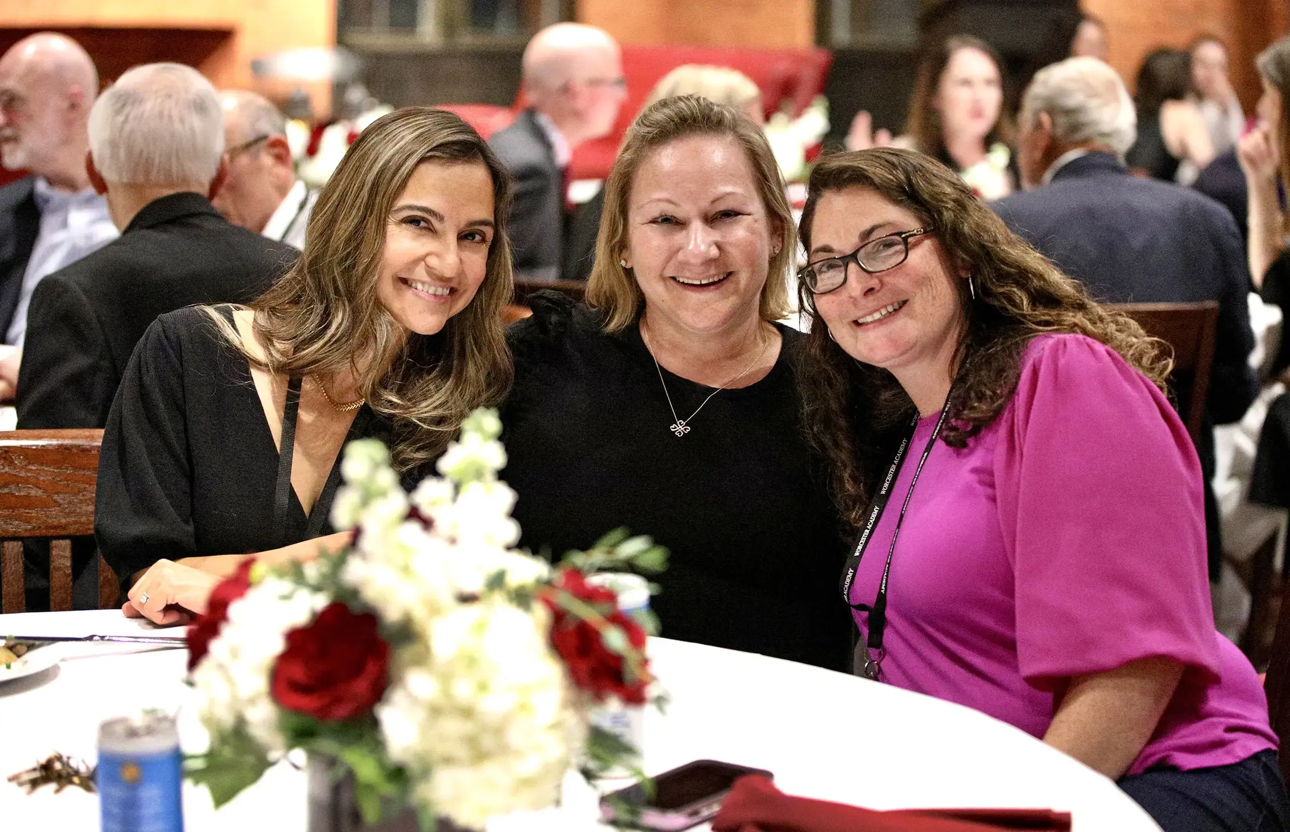Three alums at the Alumni Reunion Dinner event.