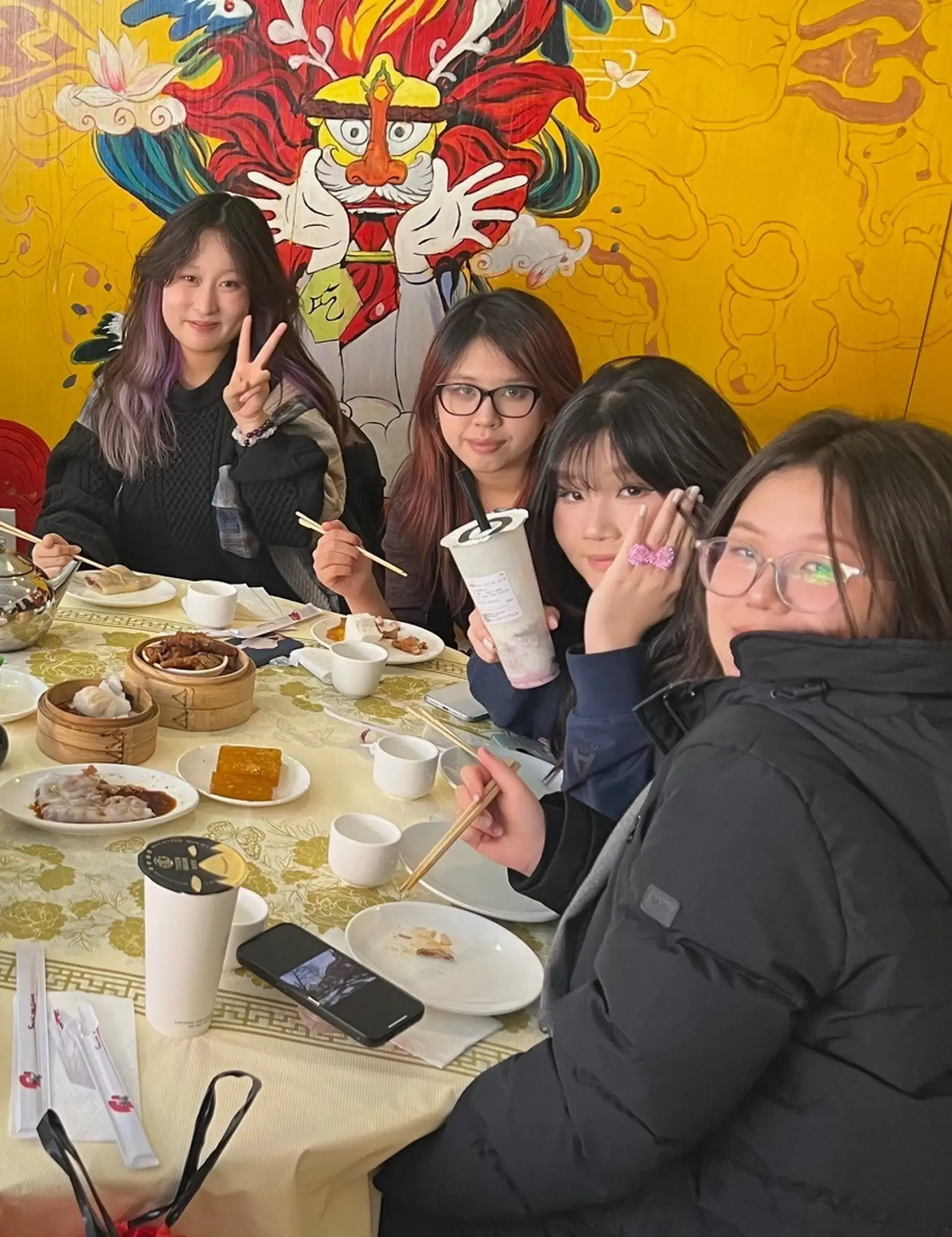 Worcester Academy students eating  at a restaurant. 