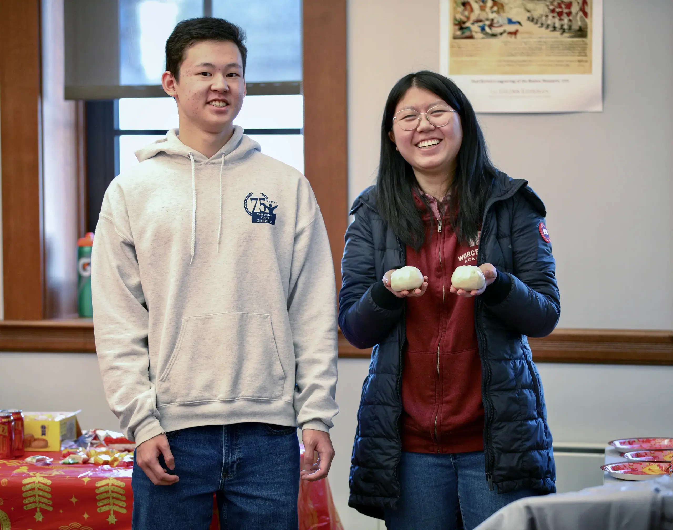 Two students giving a presentation.