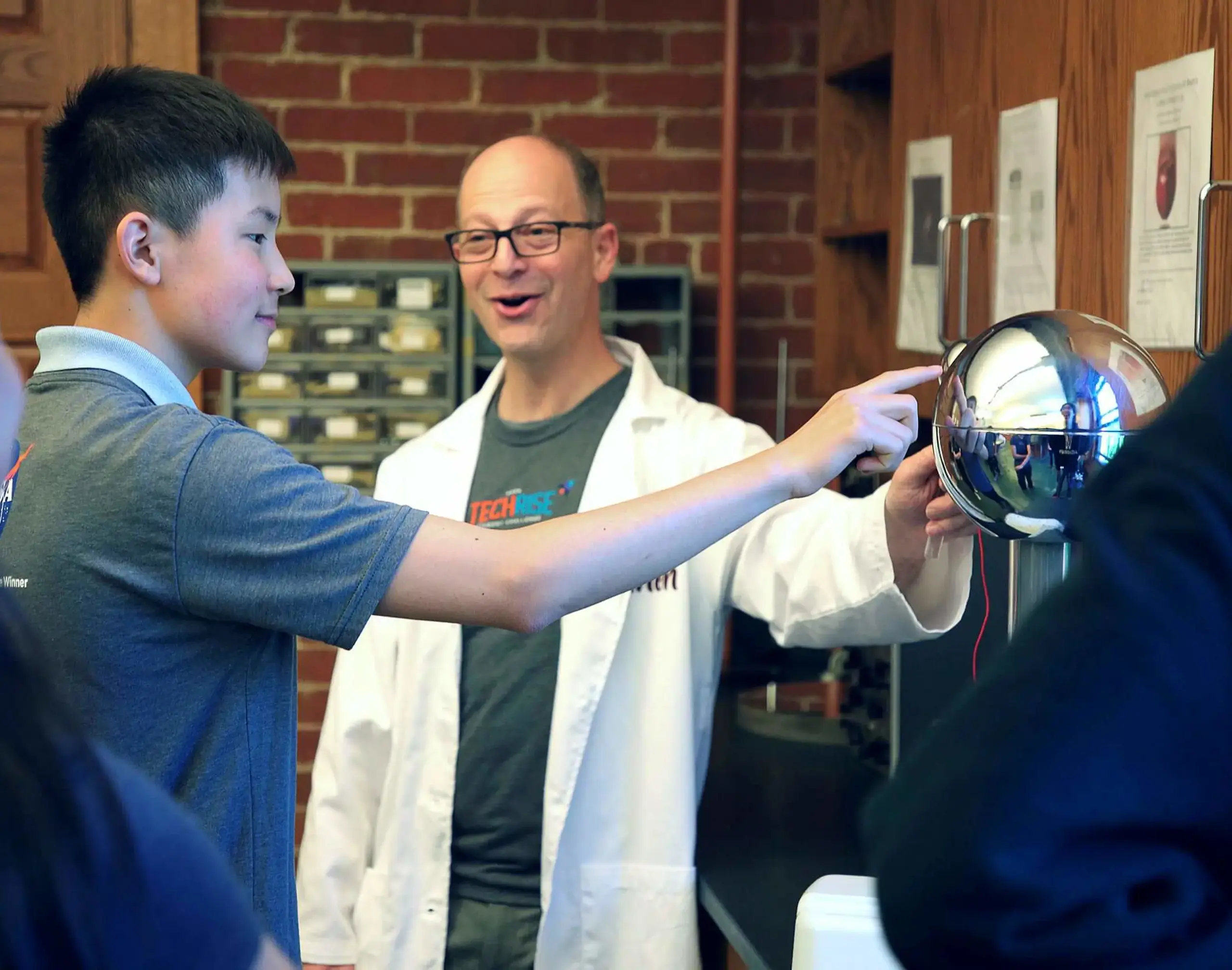 Worcester Academy student and teacher in a science lesson.