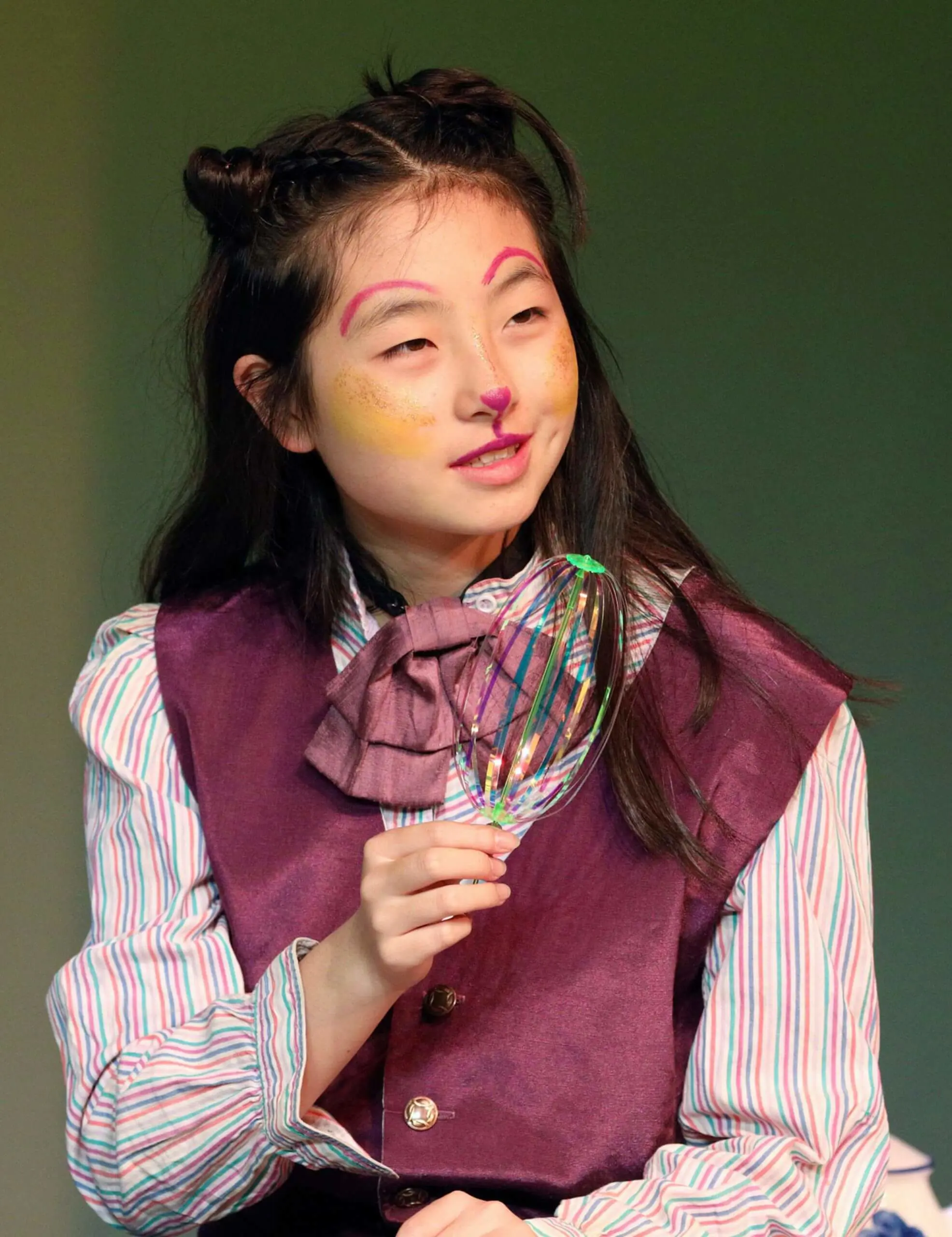 Worcester Academy Middle School student in a production of Alice In Wonderland.