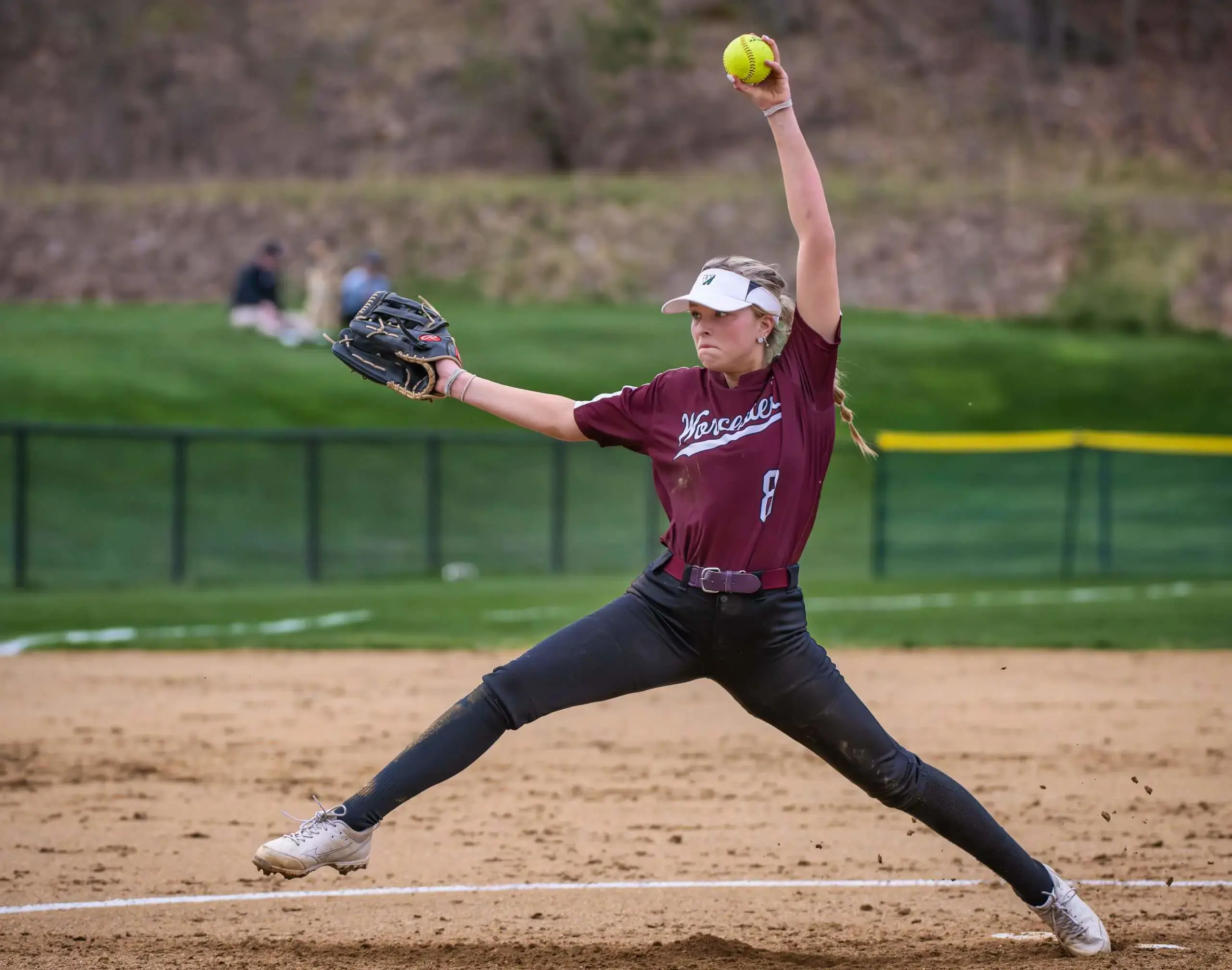 Worcester Academy Student pitching a baseball