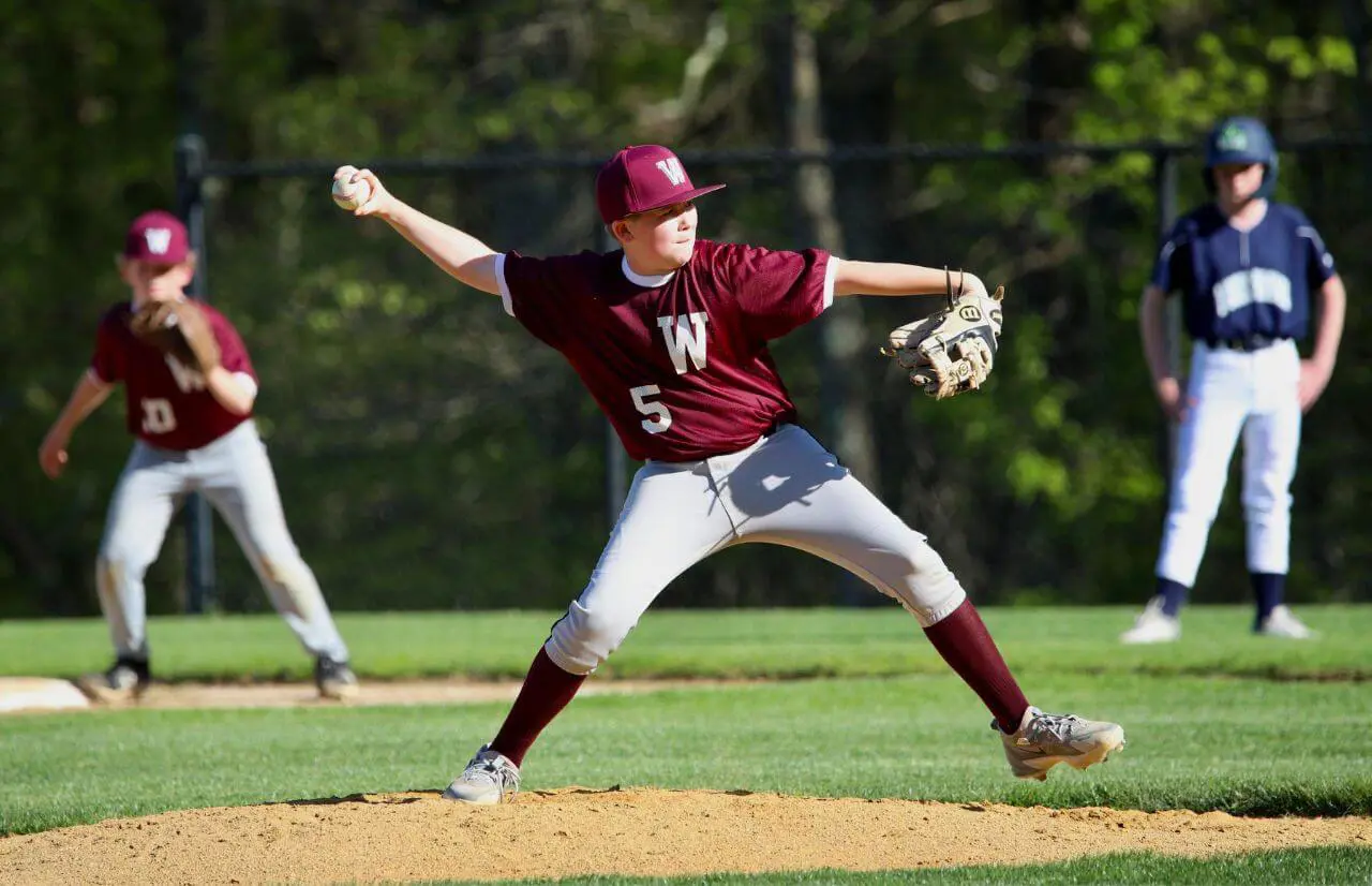 Worcester Academy Student playing baseball.