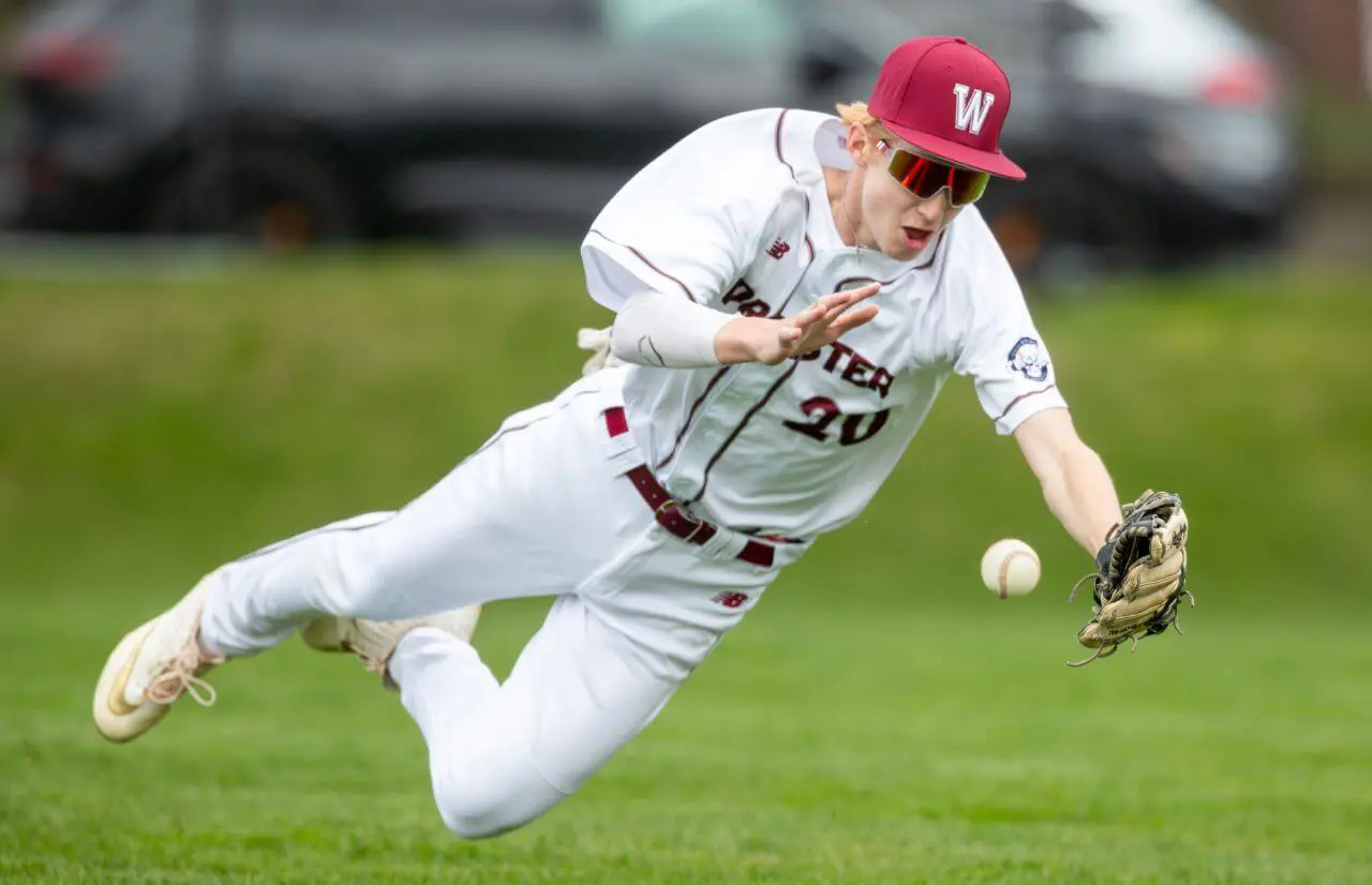 Worcester Academy Student playing baseball.