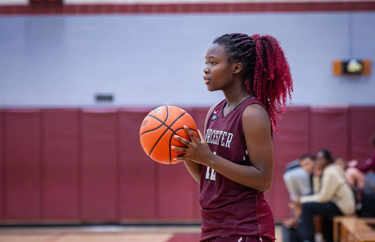 Worcester Academy Student playing basketball.