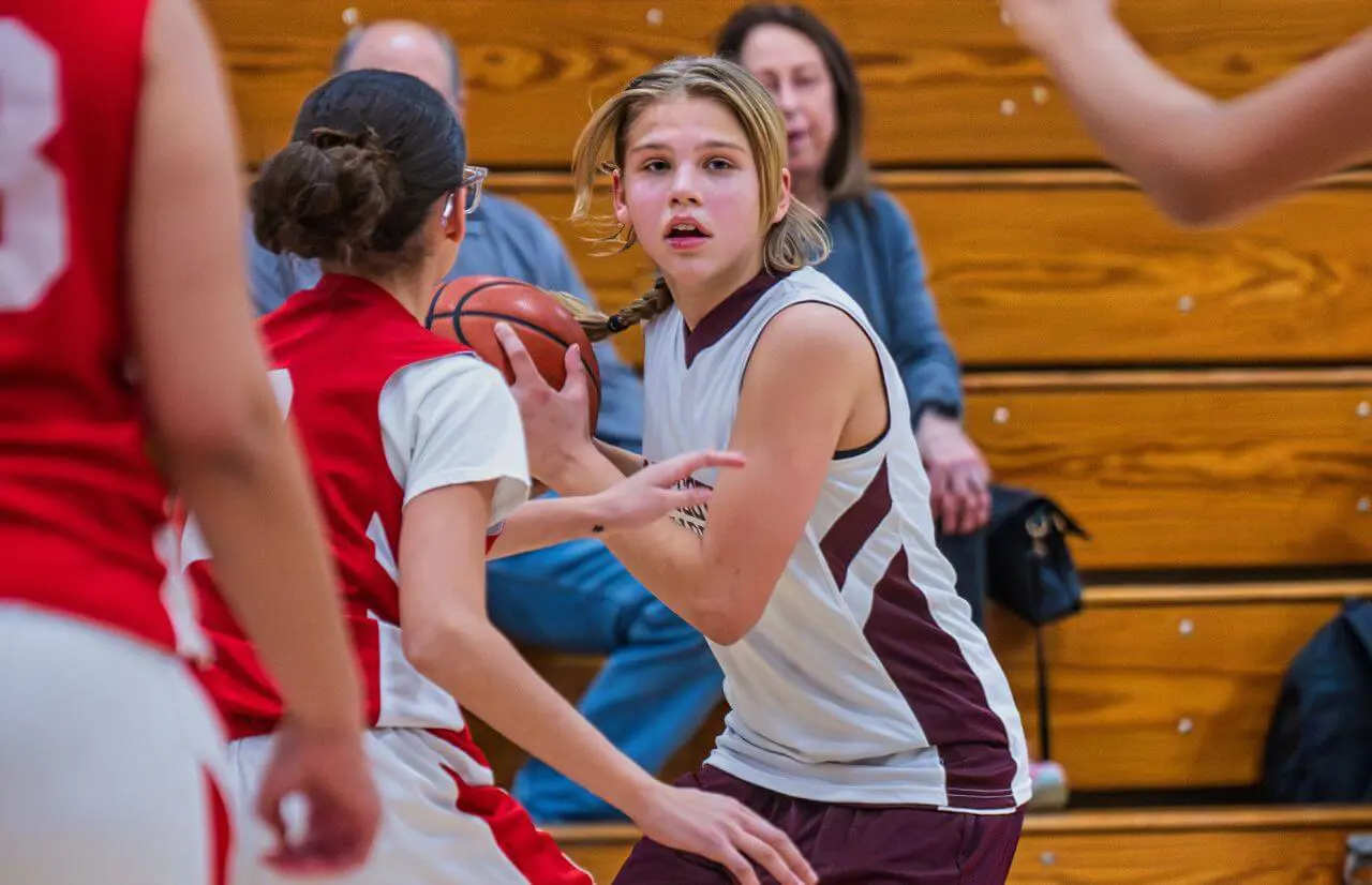 Worcester Academy Student playing basketball.