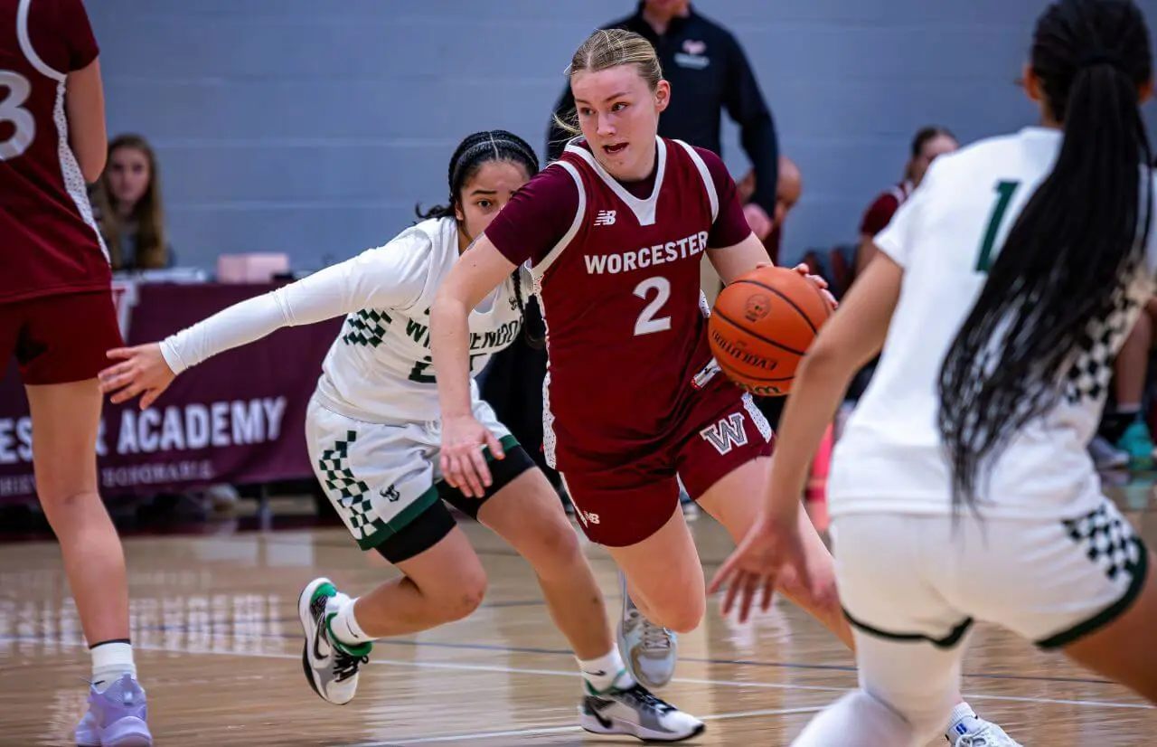 Worcester Academy Student playing basketball.