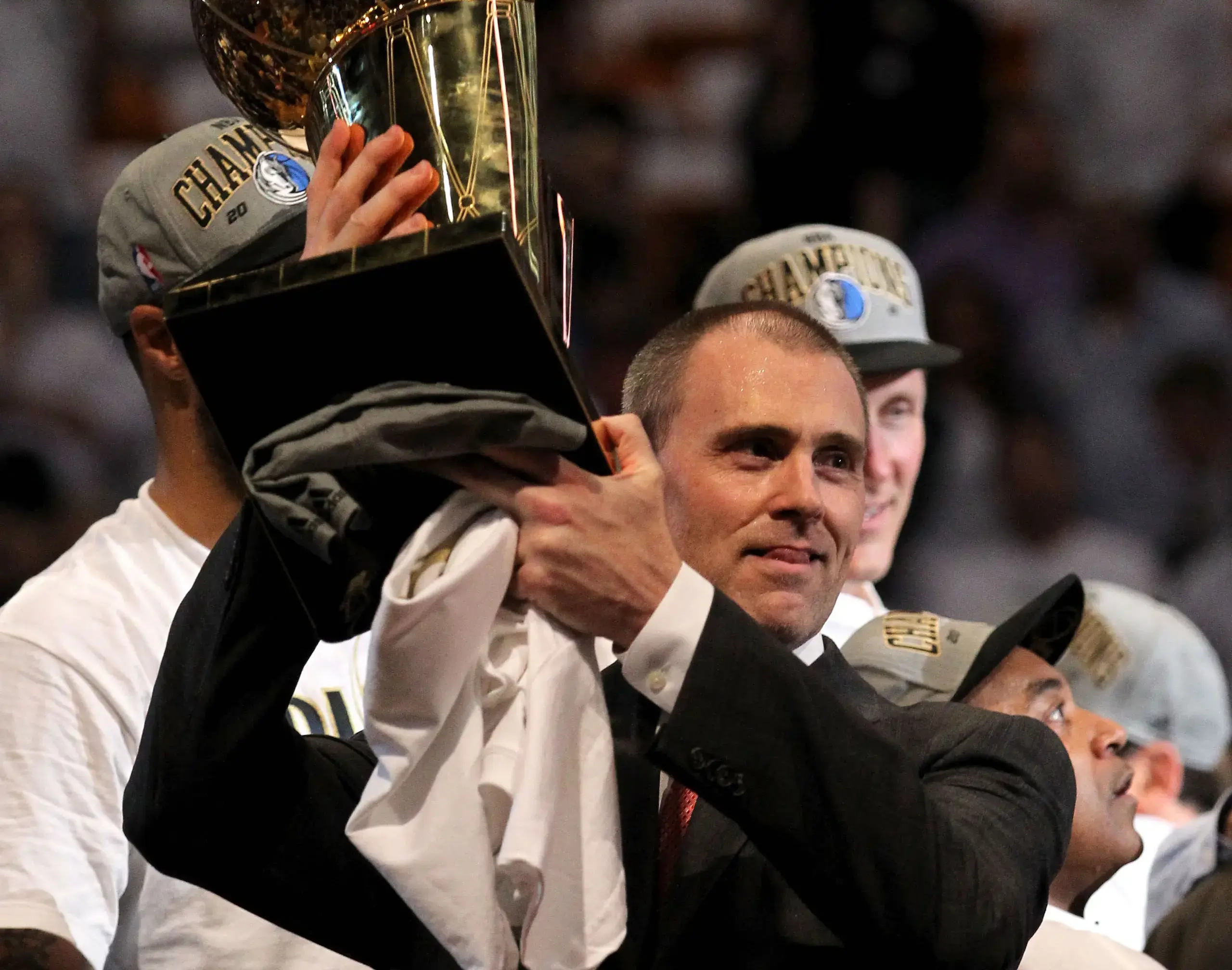 Rick Carlisle holding a trophyContent - Landscape Image,Rick Carlisle,Coach,Trophy