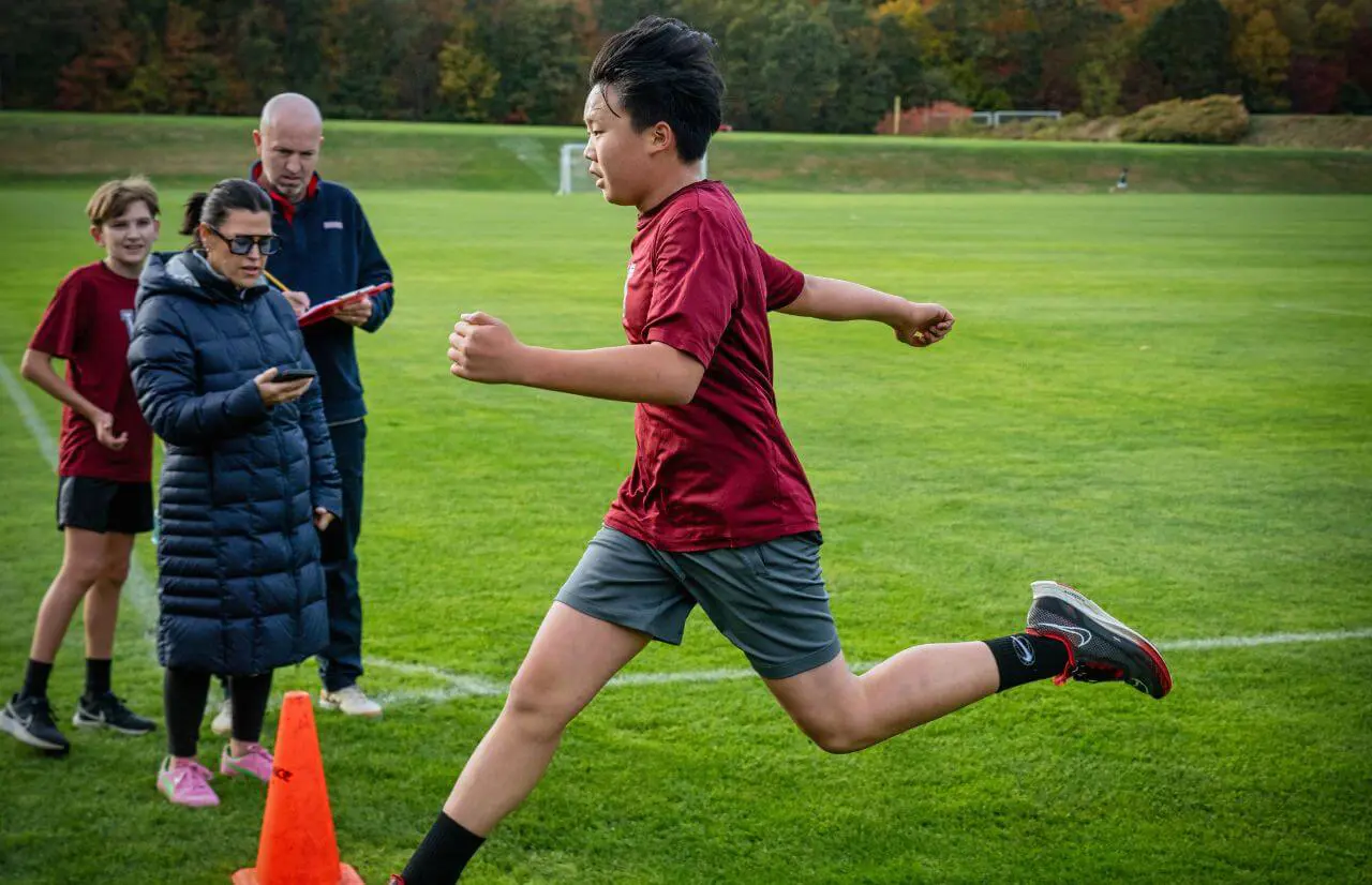 Worcester Academy Student running.