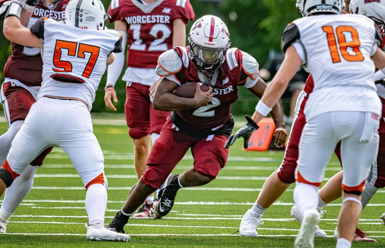 Worcester Academy Student playing football.