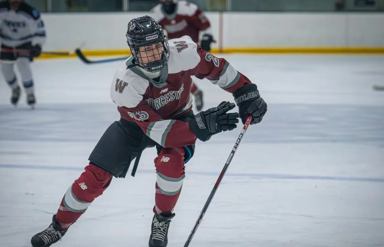 Worcester Academy Student playing hockey.