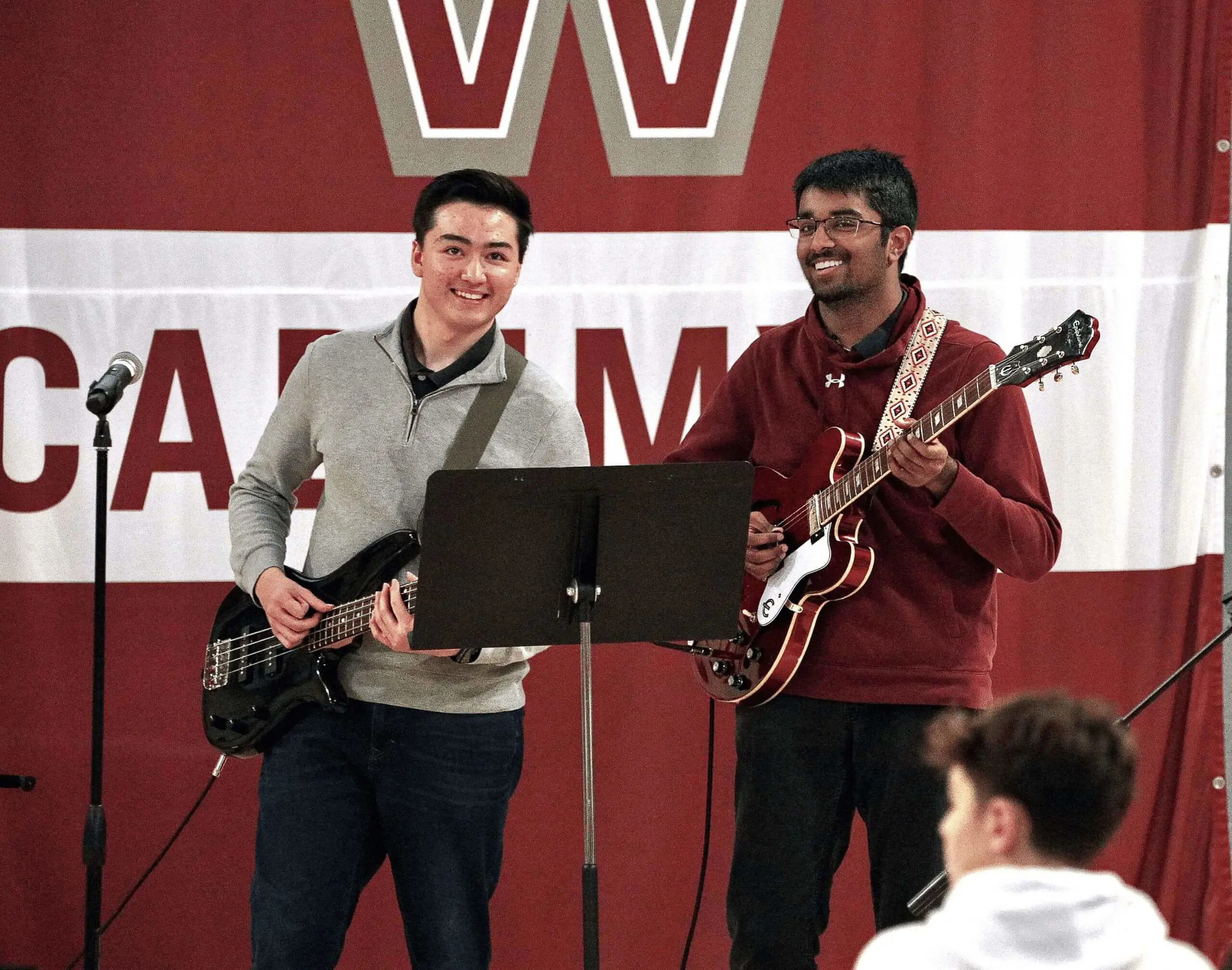 Worcester Academy Students performing in a band with guitars