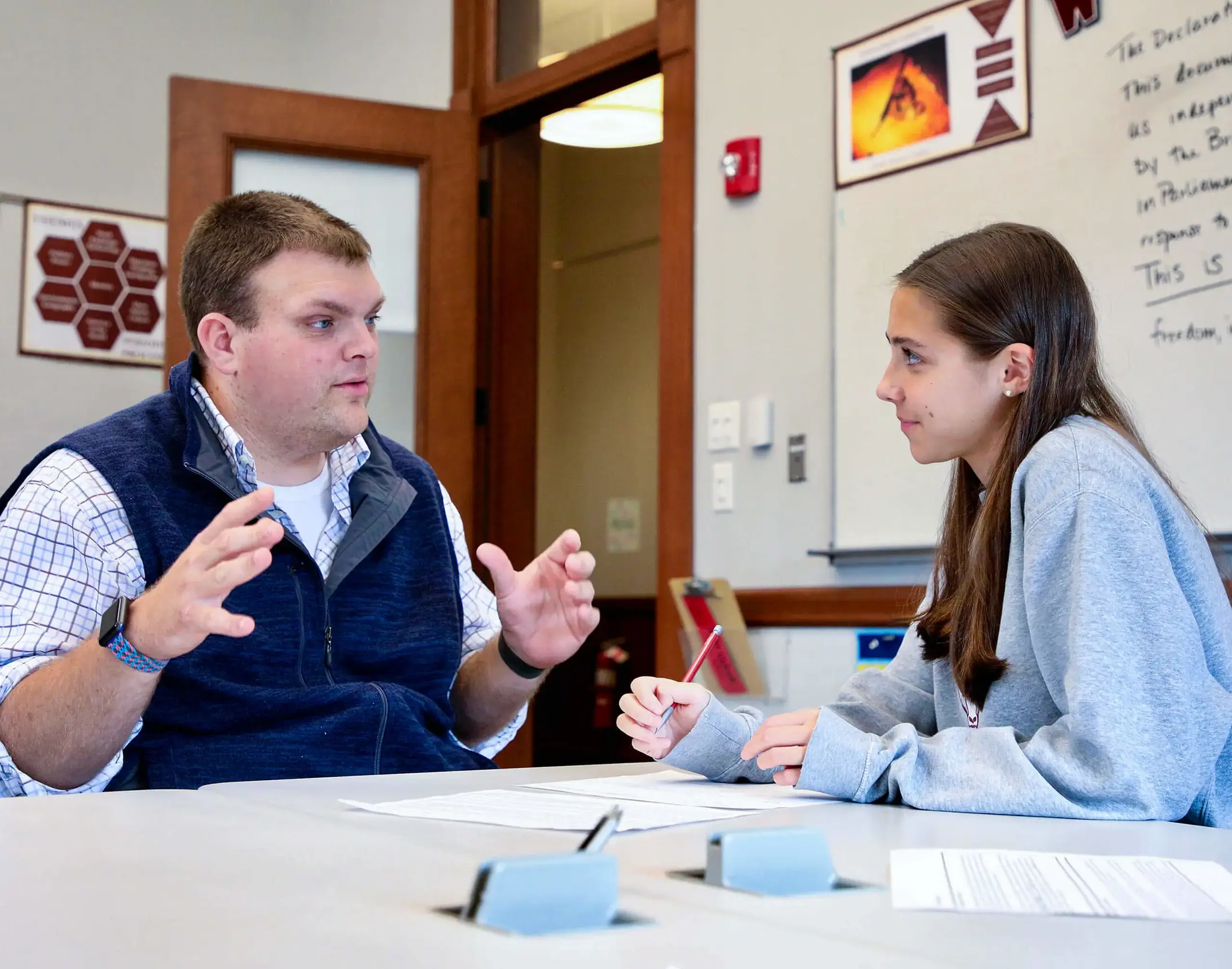 Worcester Academy Student and Teacher in a history class