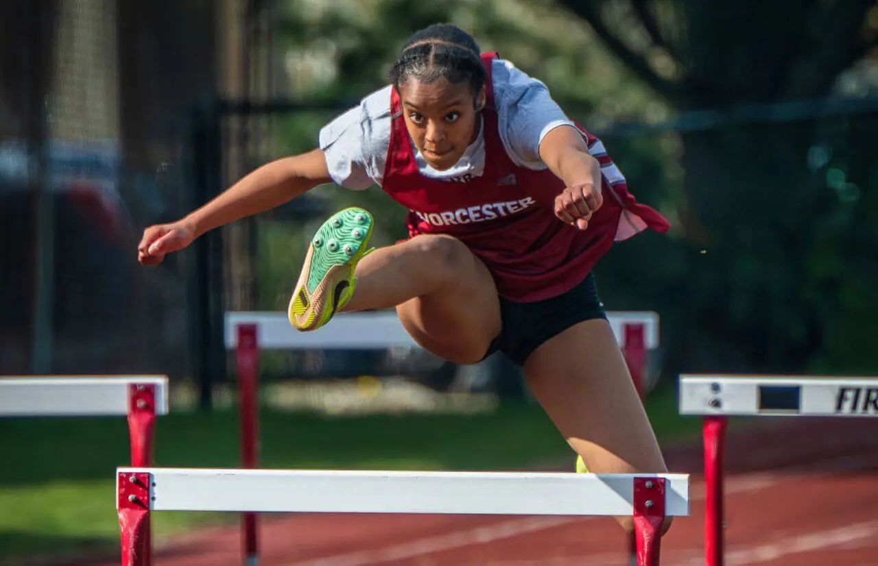 Worcester Academy Student hurdling.