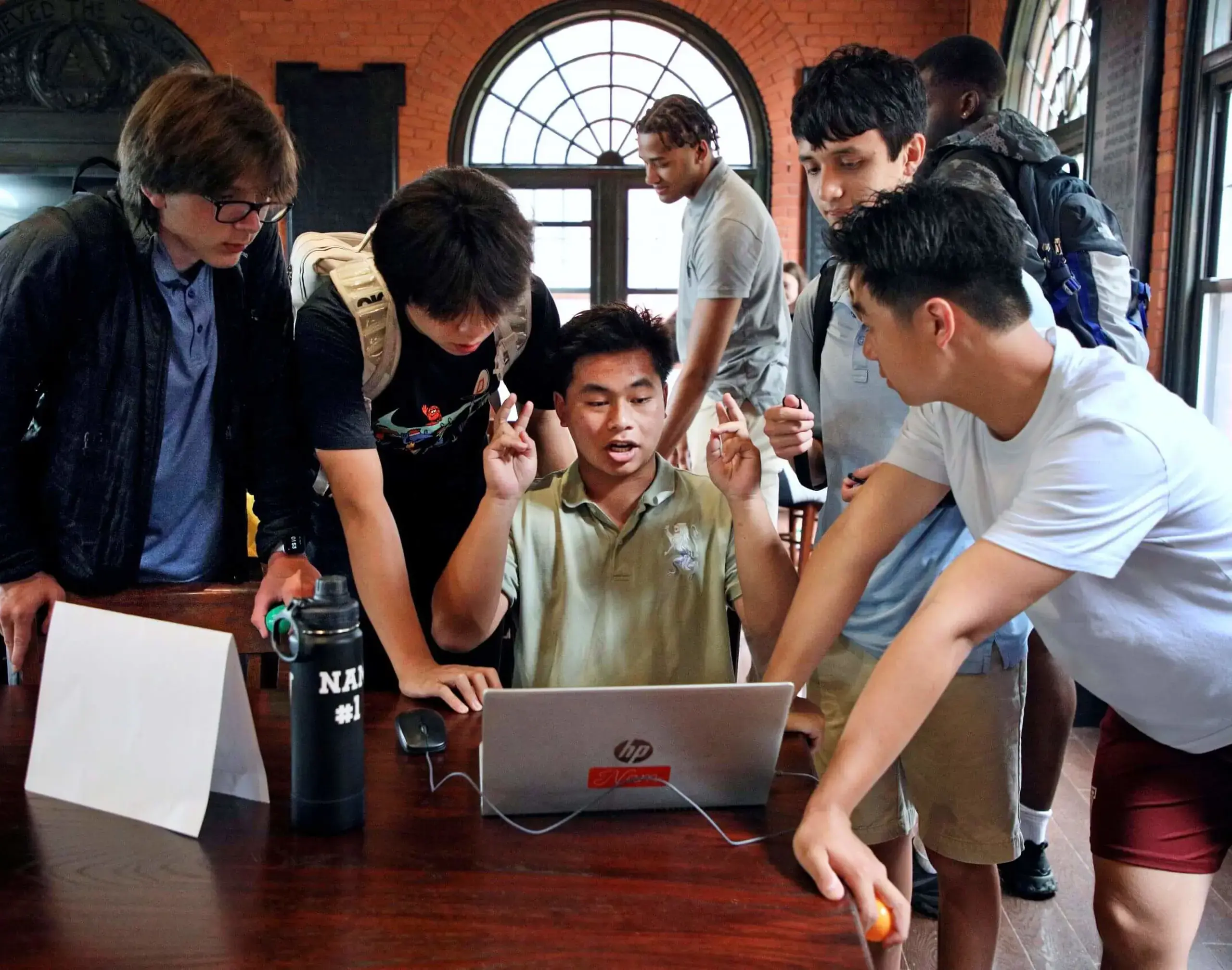 Worcester Academy Upper School Students working on a laptop.