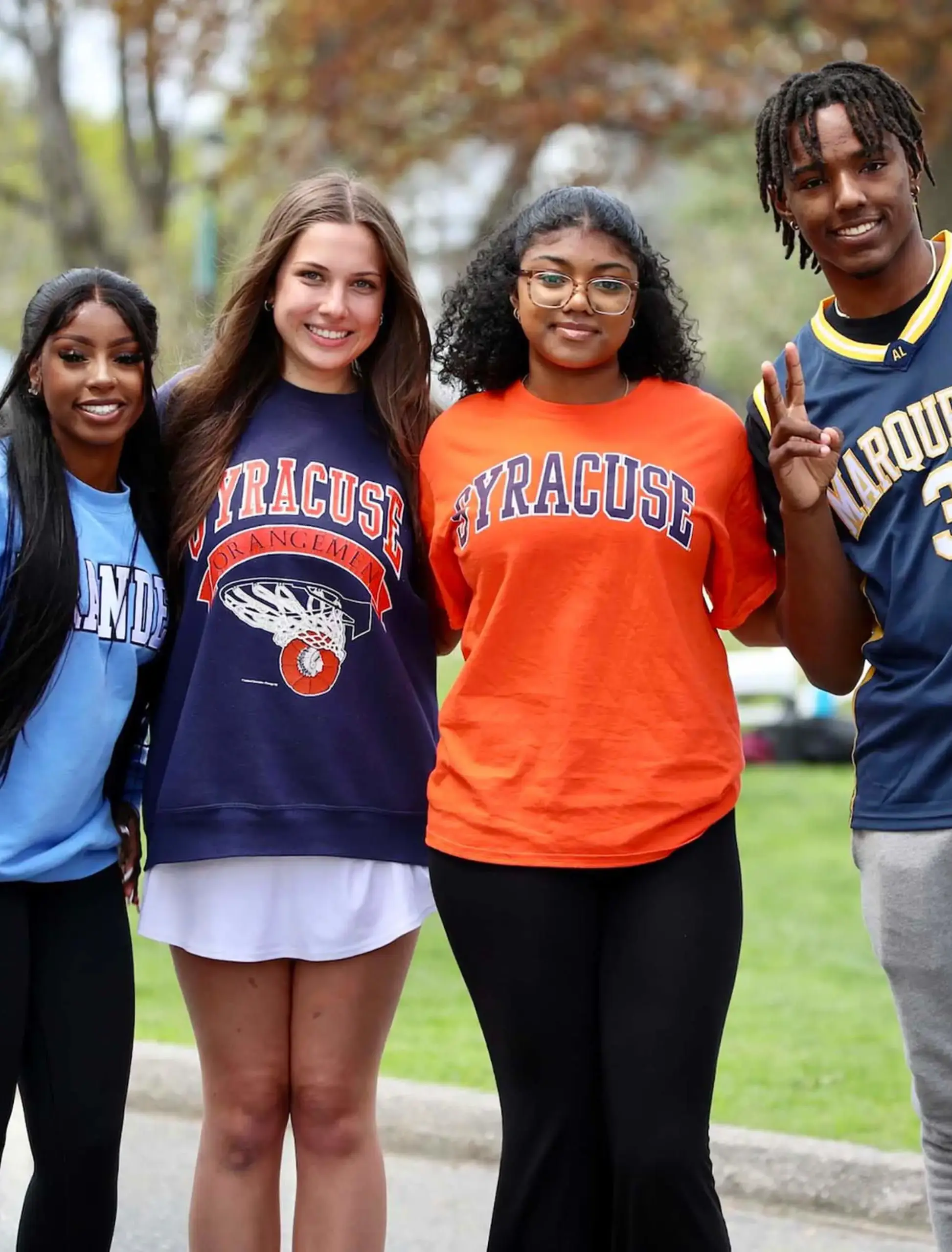 Worcester Academy Upper School students wearing college t-shirts.