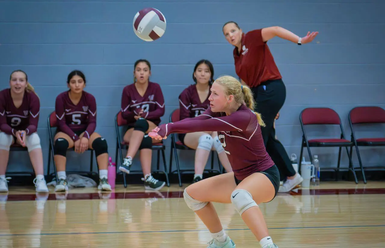 Worcester Academy Student playing volleyball.