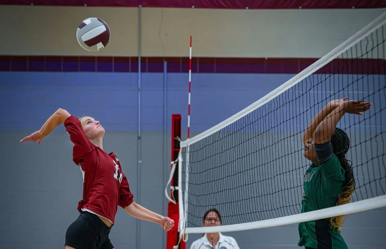 Worcester Academy Student playing volleyball.